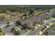 Aerial view of homes in a residential neighborhood near the street and intersection at 2884 Nottel Dr, St Cloud, FL 34772