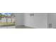 Bright living room with view of outdoor landscaping and neutral paint colors for a clean, blank canvas at 2884 Nottel Dr, St Cloud, FL 34772