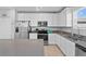 Bright kitchen features stainless appliances, and ample counter space at 293 Pineywoods St, St Cloud, FL 34772