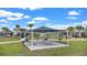 The community's picnic area features shaded tables and grills for convenient outdoor dining near the pool at 293 Pineywoods St, St Cloud, FL 34772