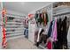 Spacious walk-in closet with custom shelving and ample storage space at 293 Pineywoods St, St Cloud, FL 34772