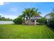 Large backyard with pool, lush trees, and ample space for outdoor activities at 3100 Stonewyck St, Orlando, FL 32824