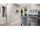 Entertainment area with a bar top, chair, and convenient access to other rooms for seamless entertaining at 3100 Stonewyck St, Orlando, FL 32824