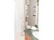 Elegant bathroom featuring a shower-tub combo, decorative window and a granite-topped vanity at 3100 Stonewyck St, Orlando, FL 32824