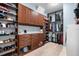 Spacious walk-in closet with custom shelving and organization system at 3100 Stonewyck St, Orlando, FL 32824