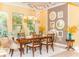 Inviting dining room with coffered ceilings, stylish light fixture, and neutral decor at 3100 Stonewyck St, Orlando, FL 32824