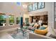 Bright, open living space with high ceilings, a modern kitchen, and elegant decor at 3100 Stonewyck St, Orlando, FL 32824