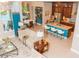Open-concept living area with a kitchen, dining area, and comfortable seating, perfect for entertaining at 3100 Stonewyck St, Orlando, FL 32824