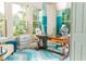 Bright and airy office with multiple windows, creating a productive workspace with plenty of natural light at 3100 Stonewyck St, Orlando, FL 32824