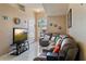 Inviting living room featuring a comfortable sectional and a bright, airy ambiance at 3112 Enclave Ct, Kissimmee, FL 34746