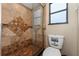 Bathroom showcasing a glass enclosed shower with decorative tile accents at 3189 Saint James Ave, Deltona, FL 32738
