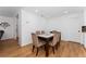 Cozy dining room featuring hardwood floors and a dining table for six at 3189 Saint James Ave, Deltona, FL 32738