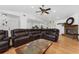 Inviting living area featuring a cozy fireplace, stylish furnishings, and an open layout at 3189 Saint James Ave, Deltona, FL 32738