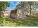 Backyard with storage shed, providing ample space for tools and outdoor equipment at 3189 Saint James Ave, Deltona, FL 32738