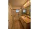 Bathroom with tile floors, a tub and shower combo, and a vanity at 3449 Village Green Ct, St Cloud, FL 34772