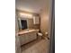 Bathroom with tile floors, a vanity, and natural-colored walls at 3449 Village Green Ct, St Cloud, FL 34772