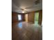 Bedroom featuring tile floors, a ceiling fan, a window and neutral-colored walls at 3449 Village Green Ct, St Cloud, FL 34772