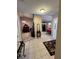 Bright foyer leading to open living spaces, highlighting the home's functional layout at 3449 Village Green Ct, St Cloud, FL 34772