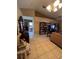 Spacious living room with high ceilings and tile flooring offers a bright and airy atmosphere at 3449 Village Green Ct, St Cloud, FL 34772