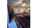 Bright living room featuring festive decor, comfortable seating, and stylish accents at 3449 Village Green Ct, St Cloud, FL 34772