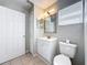Cozy bathroom with tiled floor, single vanity and natural light at 410 Lark Ct, Kissimmee, FL 34759