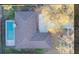 Aerial view of home featuring screened pool, backyard, and roof at 4172 Stonehenge Rd, Mulberry, FL 33860