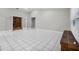 Spacious living room featuring tile flooring, fireplace, and french doors to another room at 4172 Stonehenge Rd, Mulberry, FL 33860