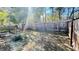 Large, fenced backyard featuring a garden area and plenty of room for outdoor activities at 419 Cierra Oaks Cir, Lady Lake, FL 32159