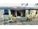 Enclosed backyard patio features a brick paver patio, plants, and seating area at 419 Cierra Oaks Cir, Lady Lake, FL 32159