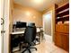 Functional office with desk and storage solutions, perfect for remote work or study at 602 N Delmonte Ct, Kissimmee, FL 34758
