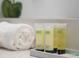 Close-up of toiletries and towel on counter at 6165 Carrier Dr # 2108, Orlando, FL 32819
