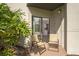 Inviting patio space with sliding glass doors, complete with outdoor seating and a peaceful setting at 6165 Carrier Dr # 2108, Orlando, FL 32819