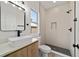 Modern bathroom boasts a stylish vessel sink, framed mirror, and separate shower with a shower niche at 6862 Se 23Rd Ave, Ocala, FL 34480