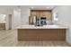 Newly remodeled kitchen has stainless steel appliances, and a spacious island at 6862 Se 23Rd Ave, Ocala, FL 34480