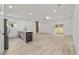 Modern living room with an open kitchen concept and light, airy design at 6862 Se 23Rd Ave, Ocala, FL 34480