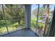 Enjoy lovely pond views from this screened-in balcony at 709 Secret Harbor Ln # 213, Lake Mary, FL 32746