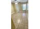 Bedroom with tile floor and closet at 709 Secret Harbor Ln # 213, Lake Mary, FL 32746