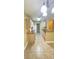 A quaint kitchen with granite counters and white appliances at 709 Secret Harbor Ln # 213, Lake Mary, FL 32746