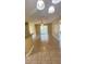 Tile living area with balcony access and views with adjoining kitchen at 709 Secret Harbor Ln # 213, Lake Mary, FL 32746