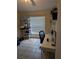 Bedroom with large window and desk and chair at 7143 Edgewater Shores Ct, Orlando, FL 32810