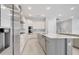 Bright kitchen features stainless appliances, island, and a modern design at 7921 Jacks Club Dr, Kissimmee, FL 34747