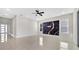 Open living space with large windows, custom wall and high ceilings at 7921 Jacks Club Dr, Kissimmee, FL 34747