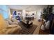 Open-concept living space with a comfortable sofa, dining area, and modern kitchen at 803 Longboat Dr, Davenport, FL 33896