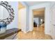 Spacious foyer showcasing tile floors, a decorative mirror, and an open floor plan at 8908 Adriatico Ln, Kissimmee, FL 34747