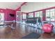 Well-equipped gym with weights, machines, and mirrors for a complete workout experience at 8982 Shine Drive, Kissimmee, FL 34747