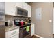 Well-equipped kitchen showcasing granite countertops, stainless steel appliances, and efficient layout at 8982 Shine Drive, Kissimmee, FL 34747