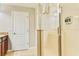 Bright bathroom showing a glass shower with tile surround and modern fixtures at 9156 Wedge Dr, Davenport, FL 33896