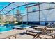 Soak up the sun by the pool in your own private oasis with ample seating at 9156 Wedge Dr, Davenport, FL 33896