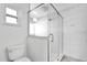 Modern bathroom featuring a glass walk-in shower and white tile at 621 Avocado St, St Cloud, FL 34769