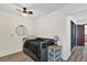 This cozy bedroom features a ceiling fan, a comfortable bed, and tasteful decor at 621 Avocado St, St Cloud, FL 34769